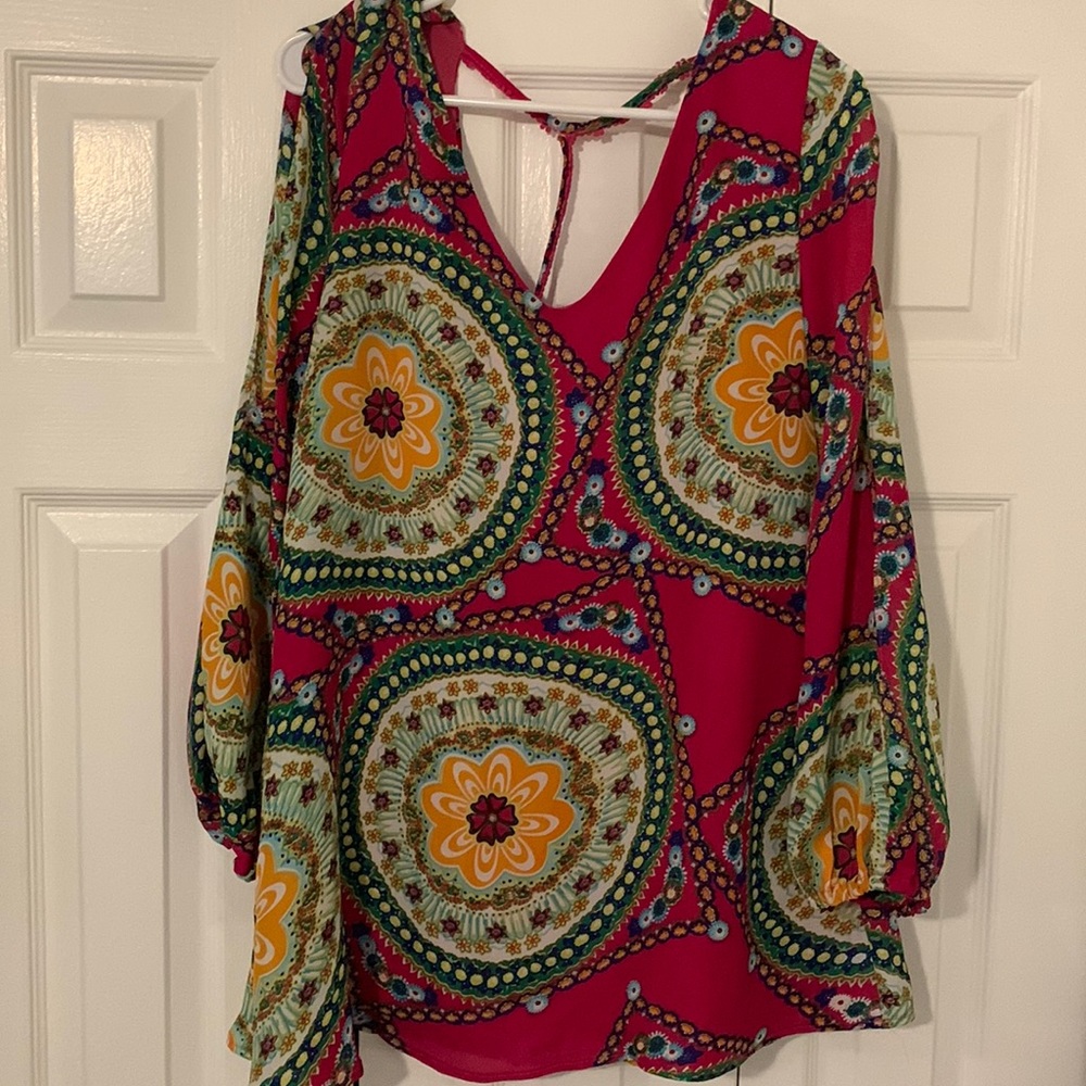 Tunic shirt. Partially open back with pink lace T strip on back